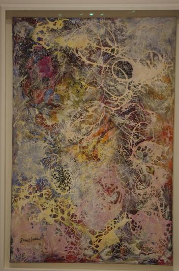 A painting of multiple colors with multiple brush strokes