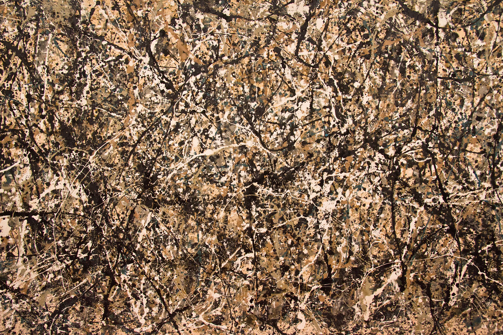 A painting of multiple colors of browns white and black with multiple brush strokes