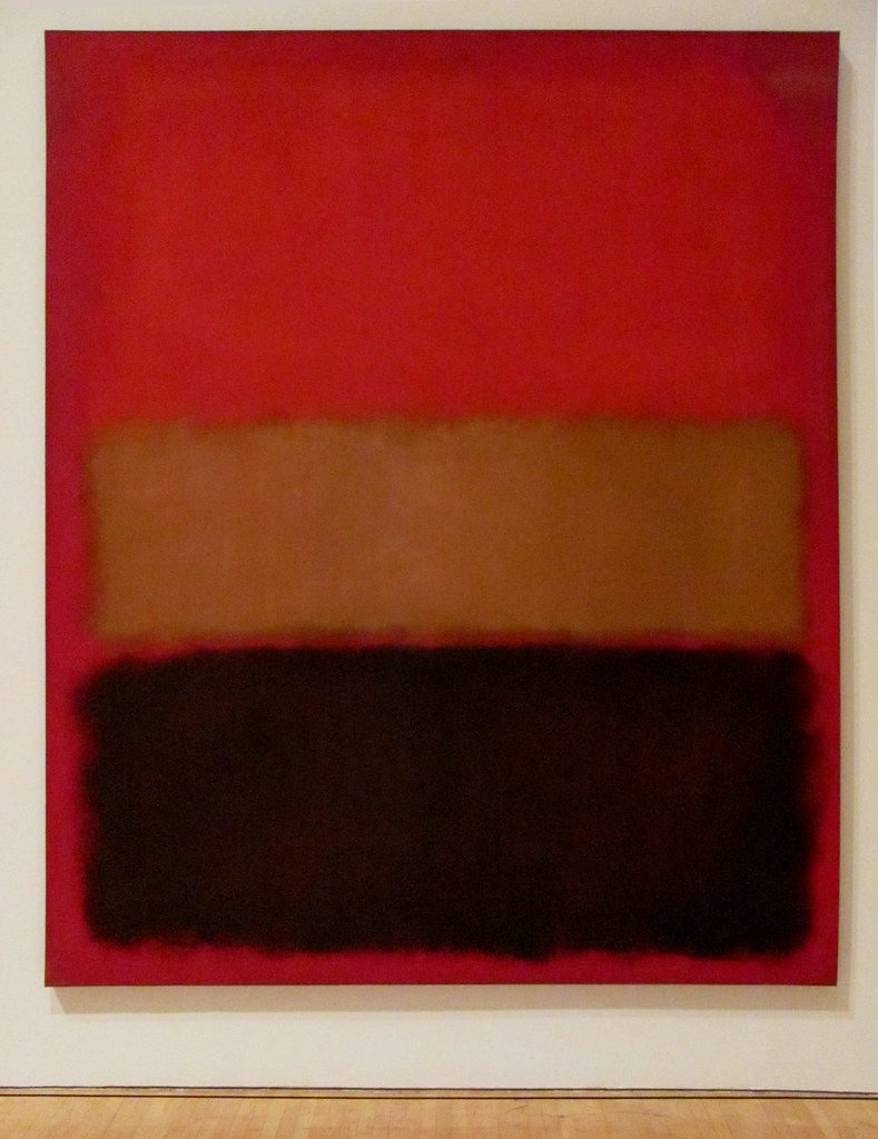 A brown, red and black painting of stripes