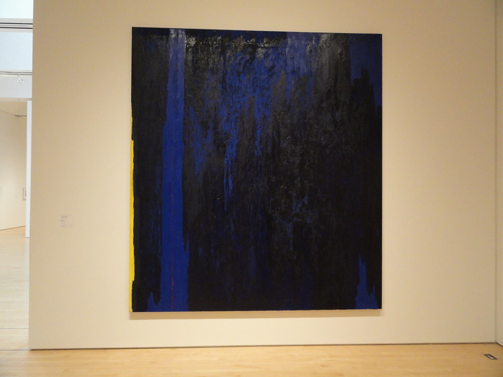 a painting of blue, yellow and black colors 