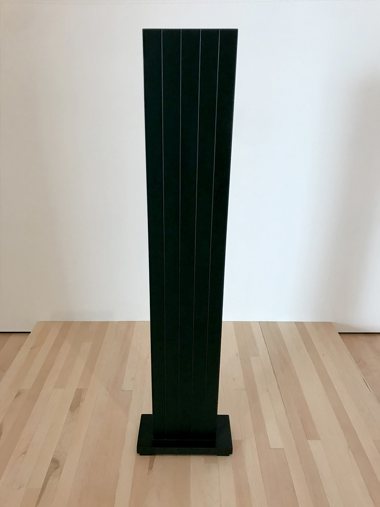 A black rectangle sculpture