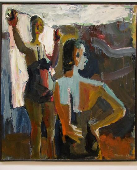 Two women standing in a room in multiple colors