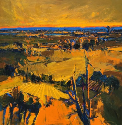 A painted landscape in many colors predominantly yellows and oranges