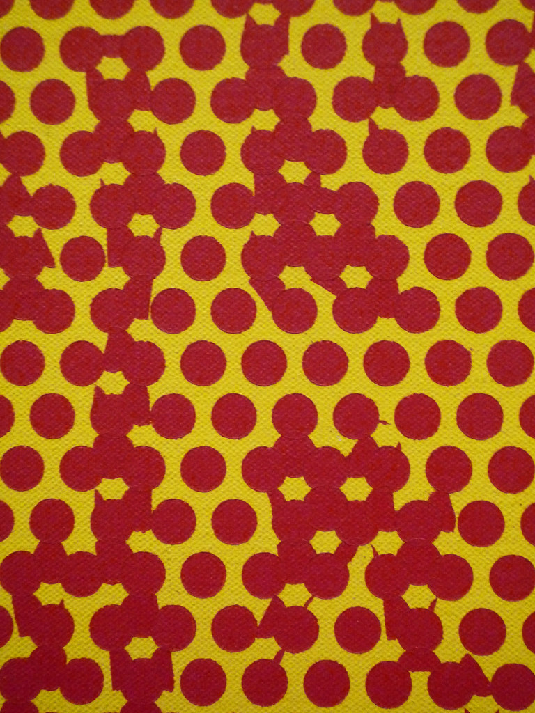 Yellow back ground with red dots 