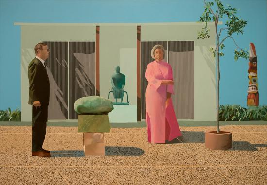 a man and woman standing out side a house with a totem pole on the right side
