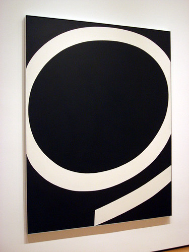 A white circle painted on a black board