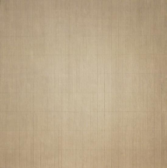 A tan board with small black lines running vertical and horizontal