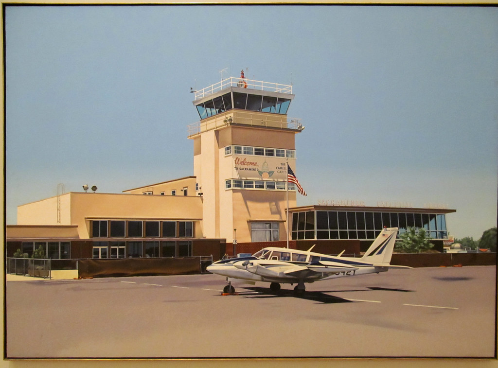 A realistic painting of a small plane in front of a small airport