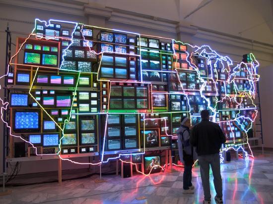 a map of the US with tv's and neon lighting around each state
