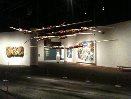 sticks wrapped with leather suspended from the ceiling