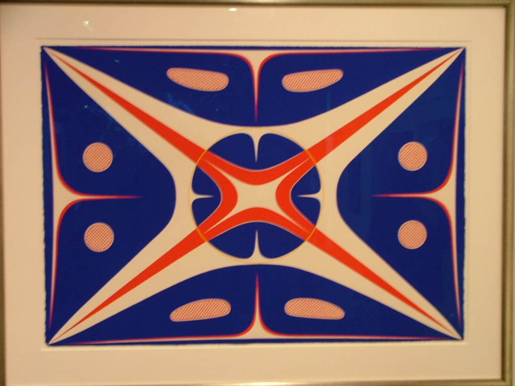 a red white and blue star shaped pattern radiating from the center
