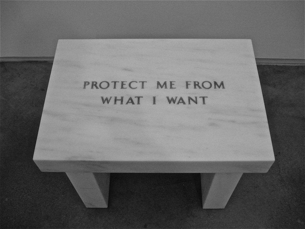 a marble bench with text on the top