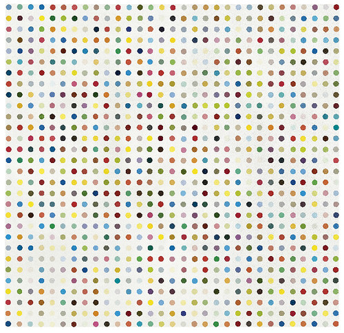 A white board with multiple colored dots