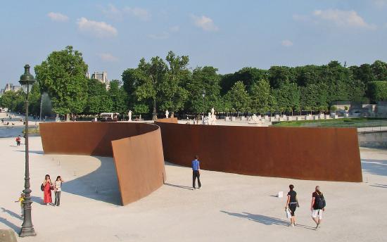 a large metal half circles facing away from each other