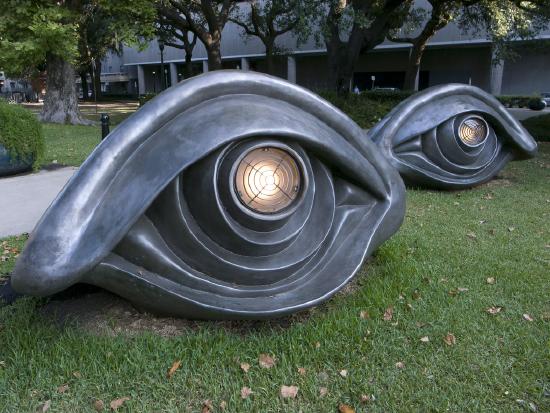 Two large bronze eyes with lights for eye balls