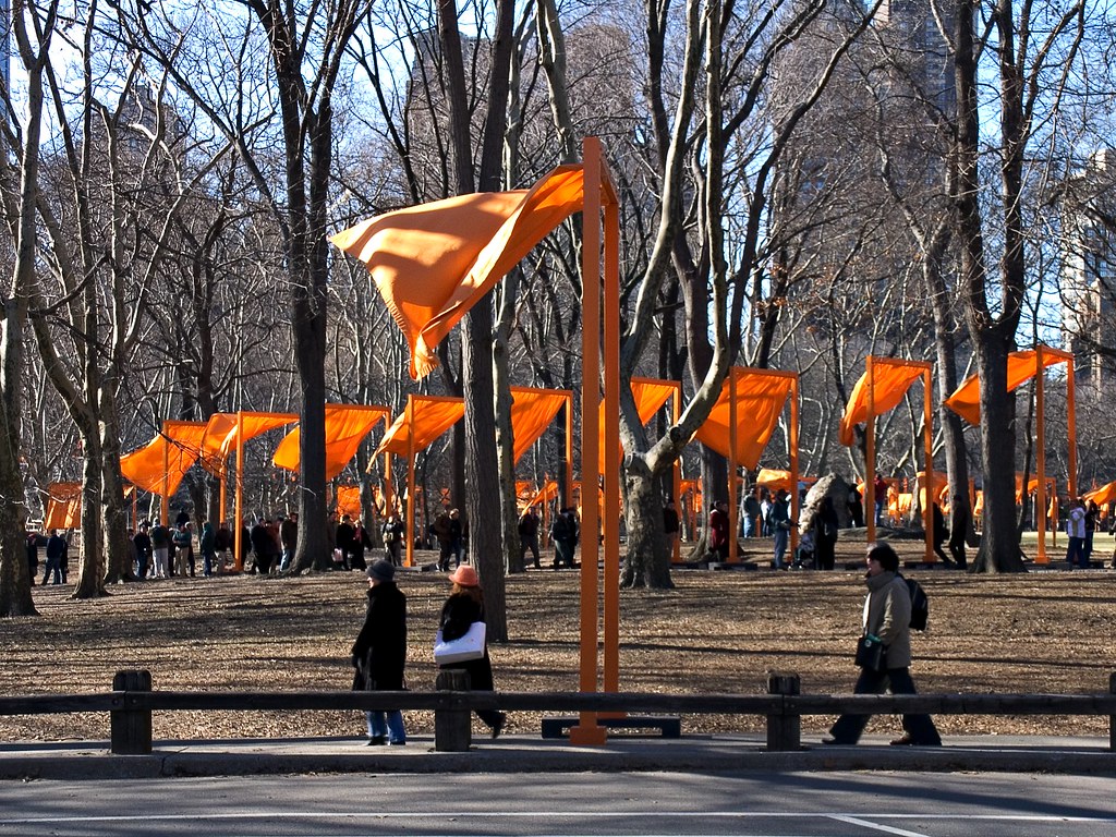 large gate like orange structures with oranges drapes