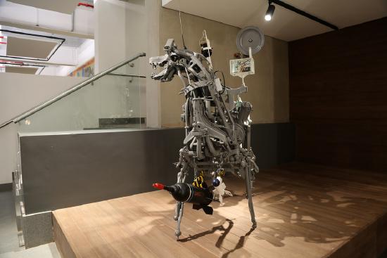 a dog made out of pieces of metal scraps