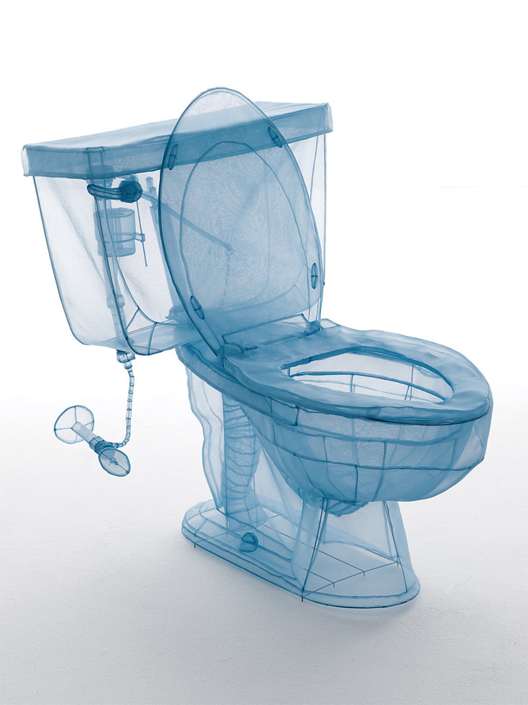 a blue toilet made of wire and fabric