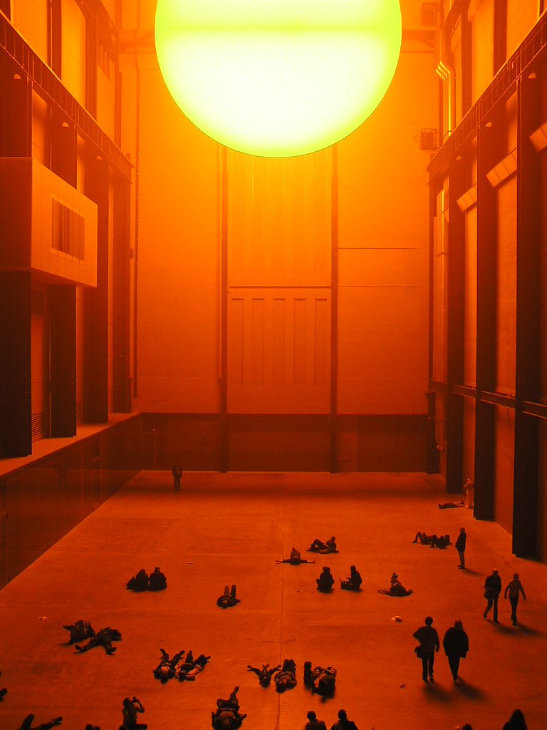 a large room in a building with a very bright sun lamp