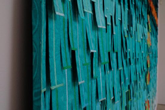 closeup of teal colored sewn fabric