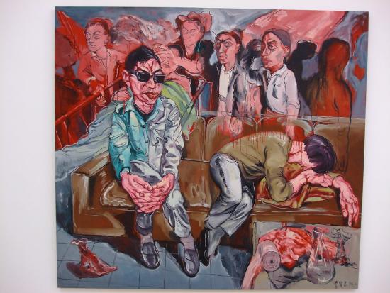 a hospital waiting room with many people and nurses