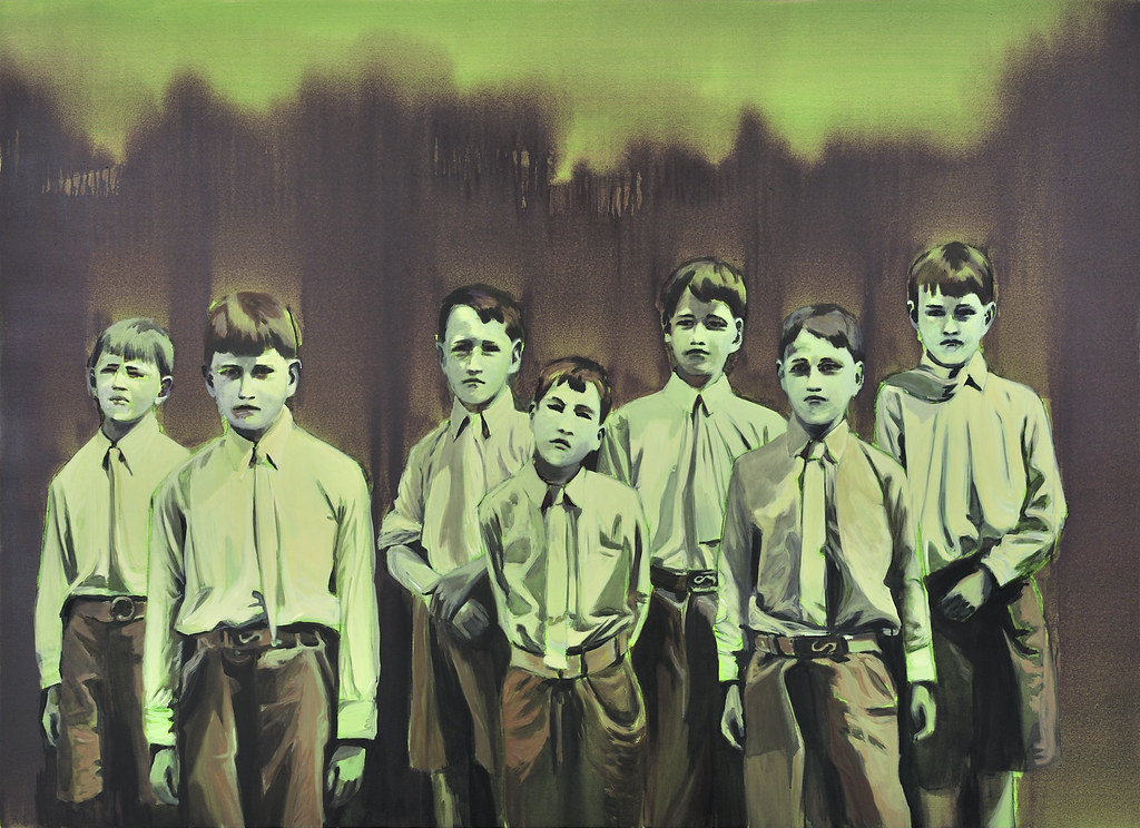 seven boys dressed in uniforms in a green palette
