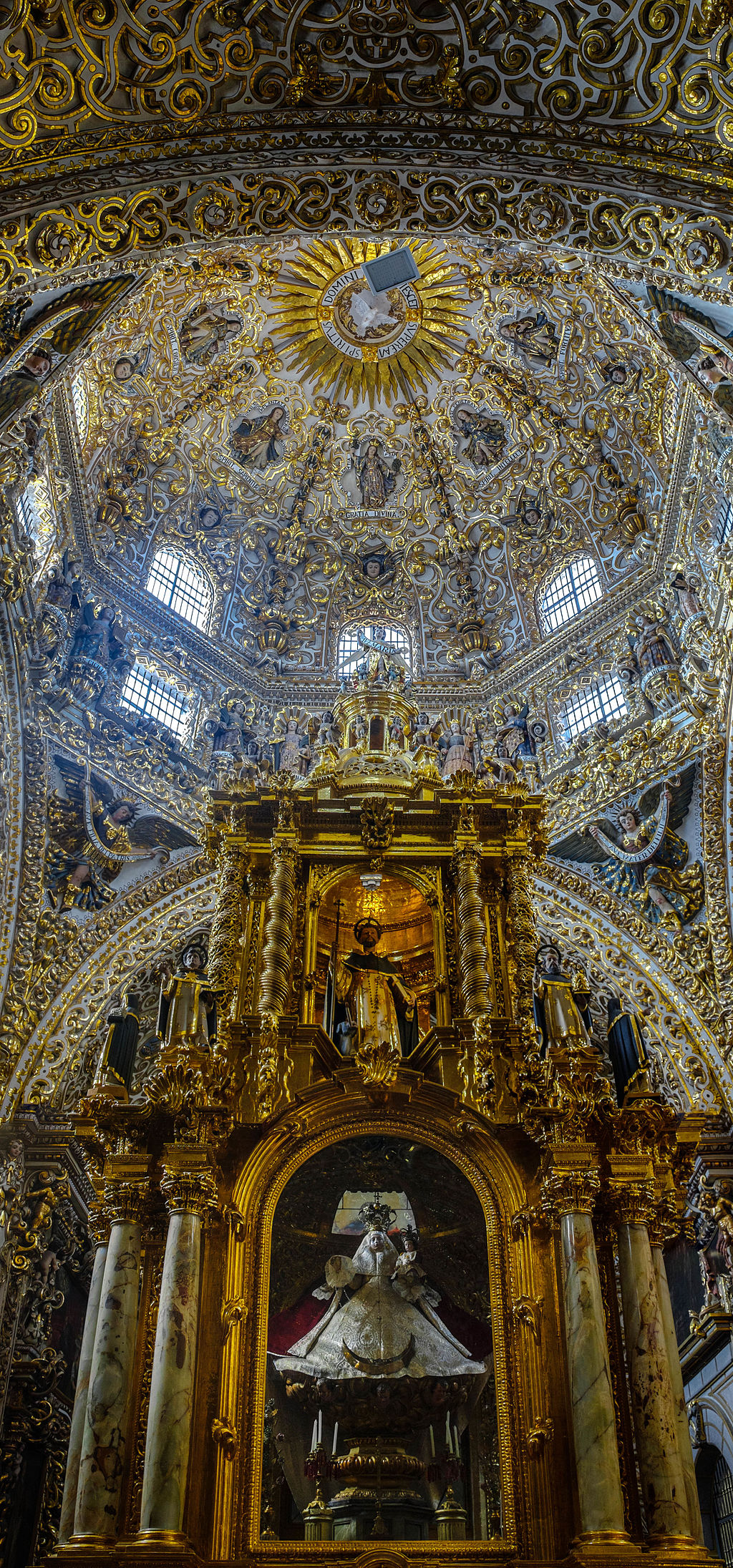 dome painted with gold swirls and and altar
