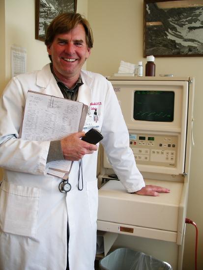 A doctor smiling for the camera