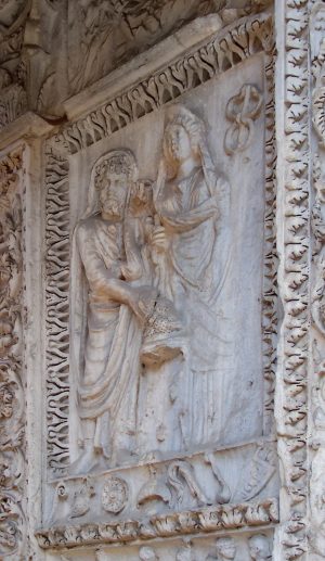 Relieve que muestra a Septimio Severo y Julia Domna con un caduceo, Arco de los Argentarios, Roma, completado 204 C.E. (foto: Panairjdde, CC BY-SA 2.0)