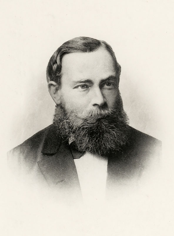 A black and white portrait from 1879 shows the 30 year old German mathematician and philosopher Friedrich Ludwig Gottlob Frege with a full beard and mustache.