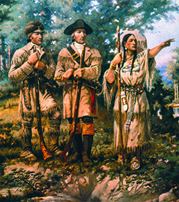 Uma pintura retrata Sacagawea conduzindo Lewis e Clark pelo deserto de Montana. Ela aponta com autoridade para a frente enquanto Lewis e Clark observam.