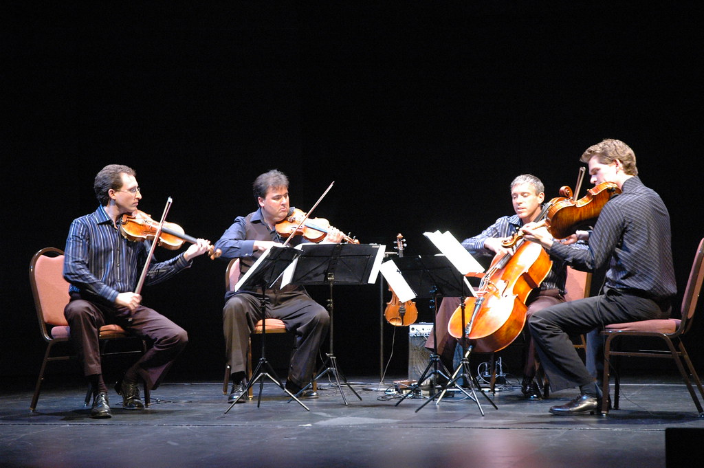 A string quartet performs live.