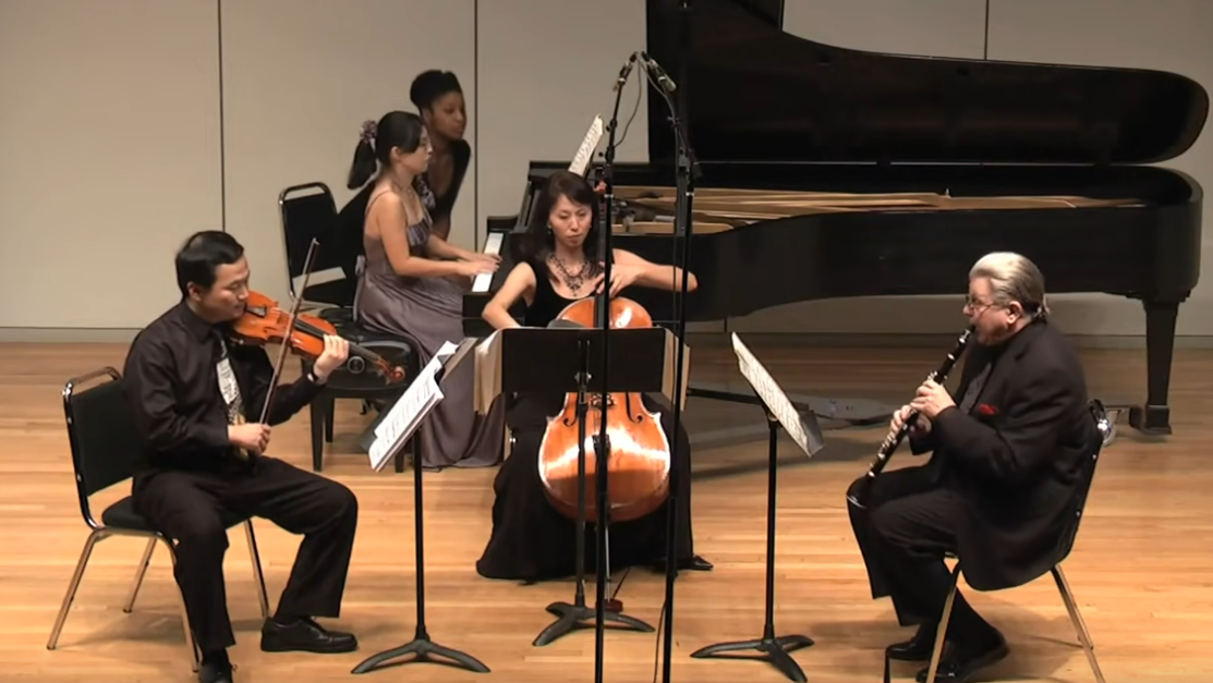 Picture of four performers playing the Quartet for the End of Time