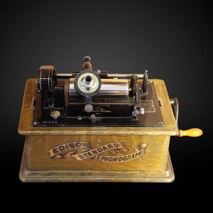 Edison's wax cylinder phonograph.