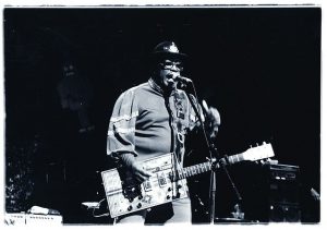 Bo Diddley on guitar.