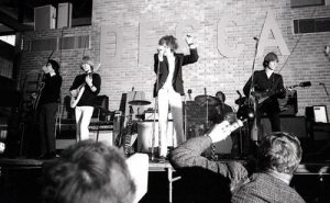 A black and white photo of The Rolling Stones performing live in Norway.