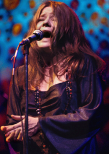 Color photo of Janis Joplin performing live (1969)
