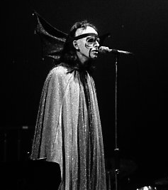Black and white photo of Genesis performing live