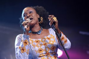 Color image of Oumou Sangaré singing.