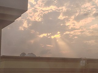 Rays of sunlight through clouds in Dubai one afternoon/
